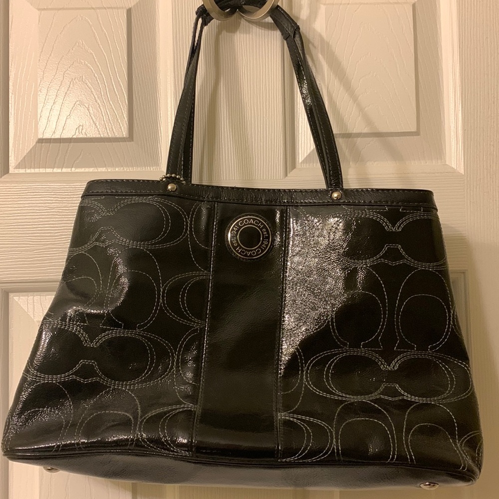 Coach black patent leather satchel in signature pattern, never used
